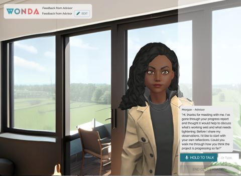 A virtual reality simulation shows an animated advisor character standing in a modern office with large windows overlooking a green outdoor landscape, accompanied by an on‑screen dialogue box prompting the user to respond in the scenario.